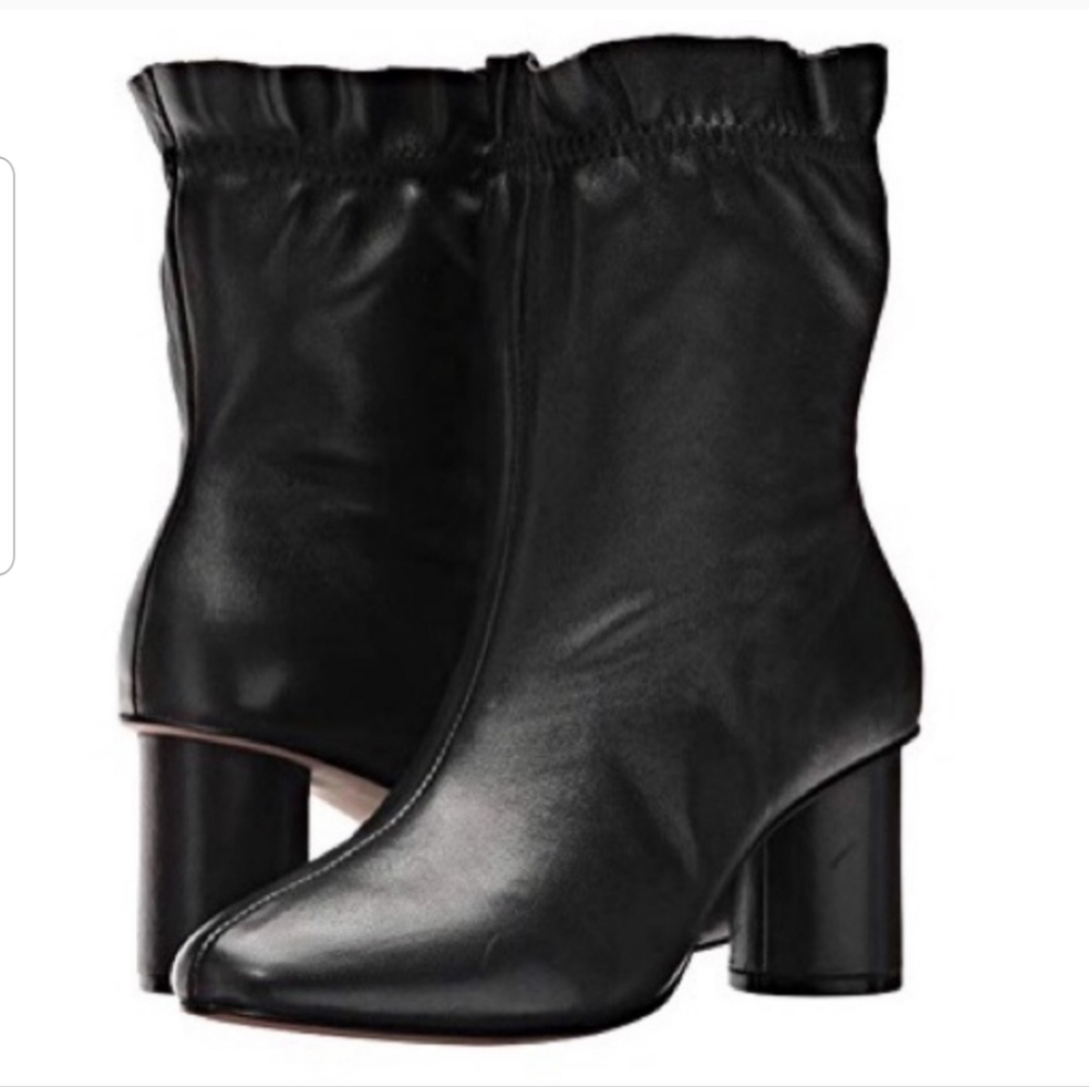 NWOT circular heel leather booties.